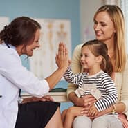 Medical billing specialist reviewing patient records